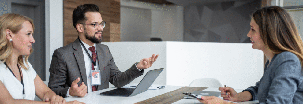 Professionals discussing how to become reseller